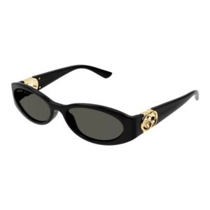 Black cat-eye sunglasses with dark lenses and gold Gucci logos on the temples.