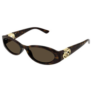 Tortoiseshell oval sunglasses with dark lenses and gold Gucci emblem on the temples.