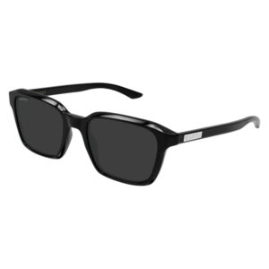 Black Gucci sunglasses with rectangular dark lenses and a glossy black frame, metal logo on the temple.