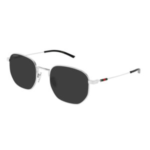 Gucci metal-frame sunglasses with dark lenses, silver finish, and black tips on the temples; Gucci branding visible on the left arm.