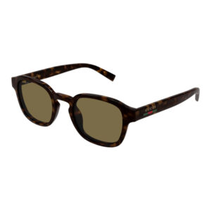 Gucci tortoiseshell sunglasses with olive-brown lenses and a Gucci stripe on the temple.