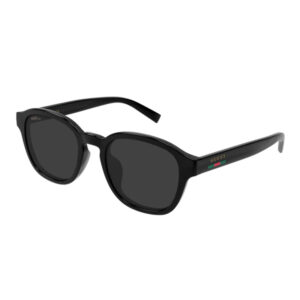Black Gucci sunglasses with dark lenses and a glossy black frame, featuring a small Gucci logo on the temple.