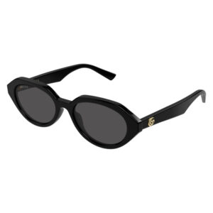 Black Gucci sunglasses with rounded lenses and thick frame, gold logo on the temple.