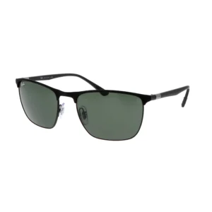 Close-up of black sunglasses with dark green lenses and visible brand logo on the lens edge.