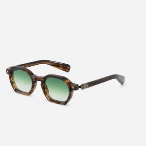 Tortoiseshell sunglasses with green gradient lenses on a white background