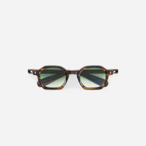 Tortoiseshell sunglasses with green gradient lenses photographed on a white background.