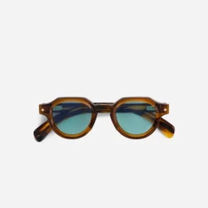 Tortoiseshell round sunglasses with blue lenses on a white background. (Informative image)