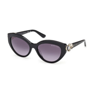 Black cat-eye sunglasses with purple gradient lenses and jeweled accent on the temple (Marciano).