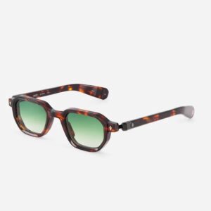 Tortoiseshell sunglasses with green gradient lenses on a white background.