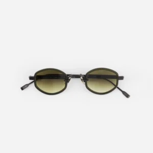 Round sunglasses with dark metal frame and olive-green lenses on a white background, metal bridge and slim temples visible