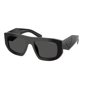 Black oversized Prada sunglasses with dark lenses and thick frame, angular design, logo on temple.