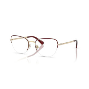Gold and burgundy metal eyeglasses with clear lenses and adjustable nose pads on a white background.