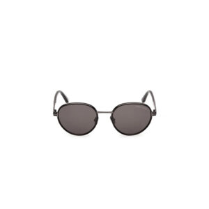 Round metal-frame sunglasses with dark gray lenses; Tom Ford logo visible on the right lens.