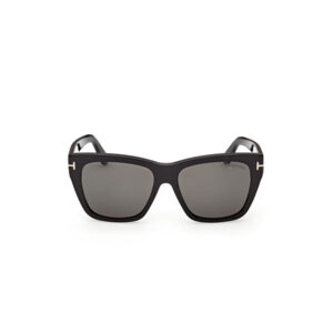 Black oversized sunglasses with gray lenses and gold hinge accents on the sides.