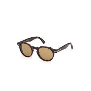 Tortoiseshell round sunglasses with amber-brown lenses on a white background