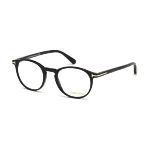 Black Tom Ford eyeglasses with round frames and gold T accents on the temples.