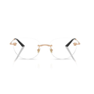 Round rimless eyeglasses with a gold nose bridge and black temple tips, resting on a white reflective surface.