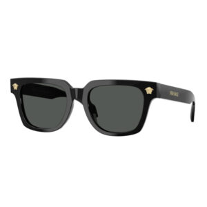 Black Versace sunglasses with a thick square frame, dark lenses, and gold logo accents on the corners of the front and temple edge