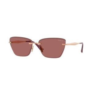 Vogue sunglasses with large brown lenses and light gold frame, pink-tinted temple tips.