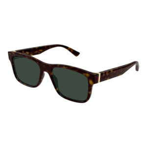 Gucci tortoiseshell sunglasses with dark green lenses and gold-accented temples
