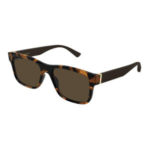 Gucci tortoiseshell sunglasses with dark brown lenses and a gold-accented temple