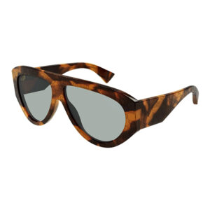 Tortoise-shell cat-eye sunglasses with gray lenses on a white background, fashion eyewear