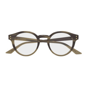 Gucci round tortoiseshell eyeglasses with light lenses and gold-accented temples; brand name visible on the arm.