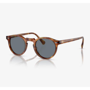 Tortoiseshell round sunglasses with dark gray lenses on a white background, lying on a reflective surface.