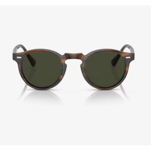 Round tortoiseshell sunglasses with dark green lenses, front view on a white background, lifestyle-ready edge.