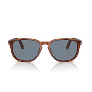 Brown acetate sunglasses with gray-blue lenses, front view reflecting on a white surface