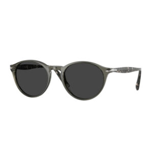 Round sunglasses with dark lenses and translucent gray-green frames, front view