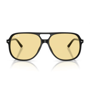 Ray-Ban sunglasses with a black frame and yellow-tinted lenses, viewed from the front on a white background with the logo visible on the lens