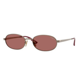 Oval red-brown sunglasses with a slim metal frame, pinkish temples, and Vogue branding on the lens.